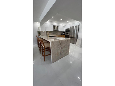 This stunning, fully remodeled apartment is the perfect blend of