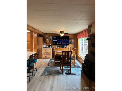 ***Huge PRICE REDUCTION*** Rare find *Level* Lakefront home sits