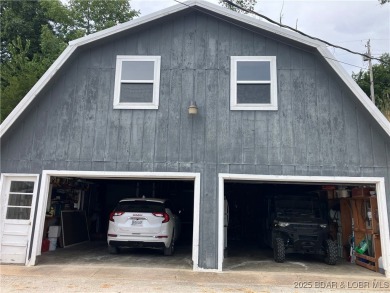 ***Huge PRICE REDUCTION*** Rare find *Level* Lakefront home sits