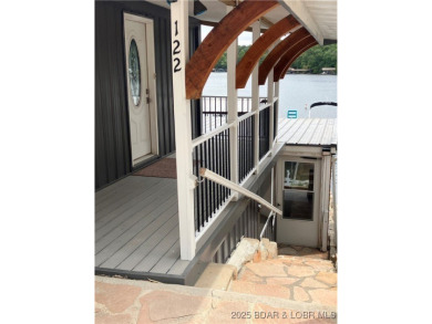 ***Huge PRICE REDUCTION*** Rare find *Level* Lakefront home sits