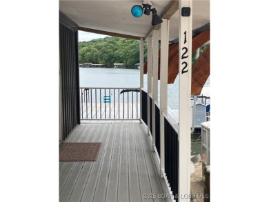 ***Huge PRICE REDUCTION*** Rare find *Level* Lakefront home sits