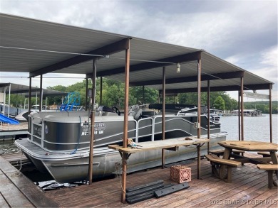 ***Huge PRICE REDUCTION*** Rare find *Level* Lakefront home sits