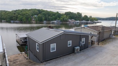 ***Huge PRICE REDUCTION*** Rare find *Level* Lakefront home sits