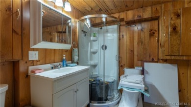 ***Huge PRICE REDUCTION*** Rare find *Level* Lakefront home sits