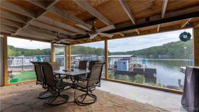 ***Huge PRICE REDUCTION*** Rare find *Level* Lakefront home sits