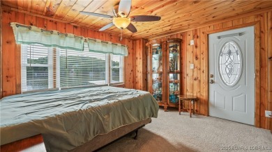 ***Huge PRICE REDUCTION*** Rare find *Level* Lakefront home sits