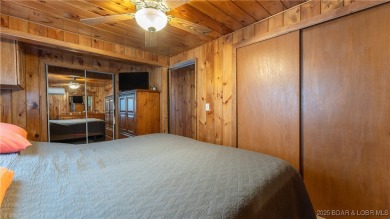 ***Huge PRICE REDUCTION*** Rare find *Level* Lakefront home sits