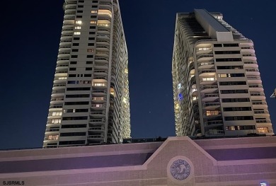 Step into the open-concept living space, where large sliding