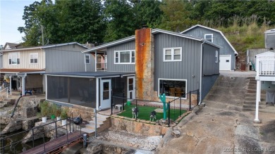 ***Huge PRICE REDUCTION*** Rare find *Level* Lakefront home sits