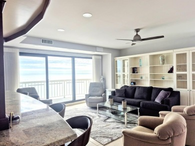 Step into the open-concept living space, where large sliding