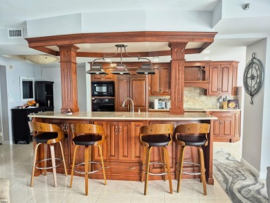 Step into the open-concept living space, where large sliding