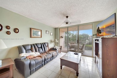 Welcome to this charming 2-bedroom, 2-bathroom condo located on