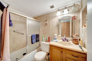 Welcome to this charming 2-bedroom, 2-bathroom condo located on