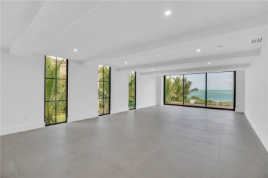 Experience unparalleled oceanfront luxury in this NEWLY