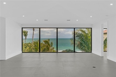 Experience unparalleled oceanfront luxury in this NEWLY