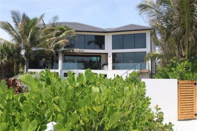 Experience unparalleled oceanfront luxury in this NEWLY