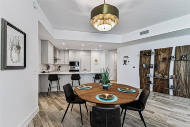 Wake to sunlit mornings and glittering Downtown Tampa vistas