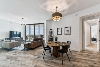 Wake to sunlit mornings and glittering Downtown Tampa vistas