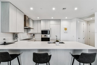 Wake to sunlit mornings and glittering Downtown Tampa vistas