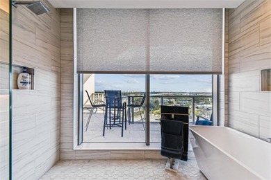 Wake to sunlit mornings and glittering Downtown Tampa vistas