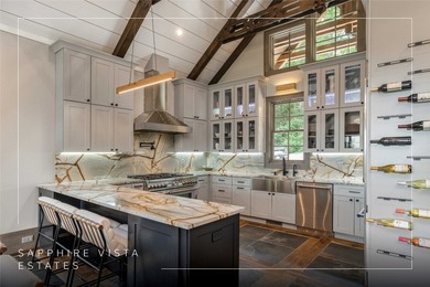 Experience refined living and rare Hogback Mountain views in