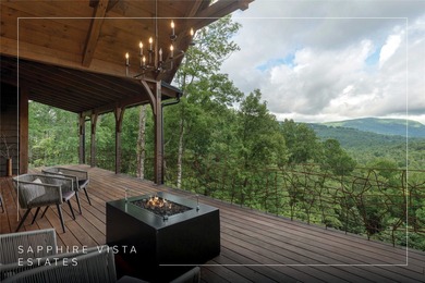Experience refined living and rare Hogback Mountain views in