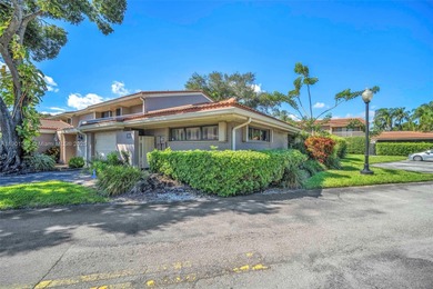 Corner one-level townhome in the sought-after Emerald Hills
