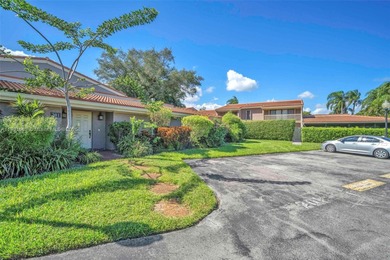 Corner one-level townhome in the sought-after Emerald Hills