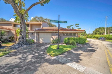 Corner one-level townhome in the sought-after Emerald Hills