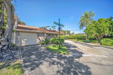 Corner one-level townhome in the sought-after Emerald Hills