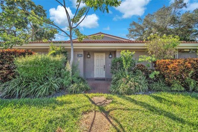 Corner one-level townhome in the sought-after Emerald Hills