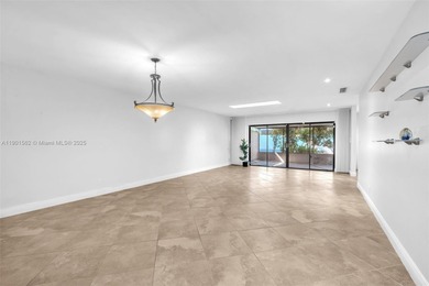 Corner one-level townhome in the sought-after Emerald Hills