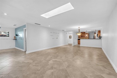 Corner one-level townhome in the sought-after Emerald Hills