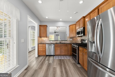 Stunning Show home in The Village at Deaton Creek with premium