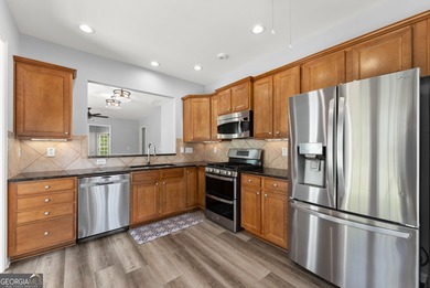 Stunning Show home in The Village at Deaton Creek with premium