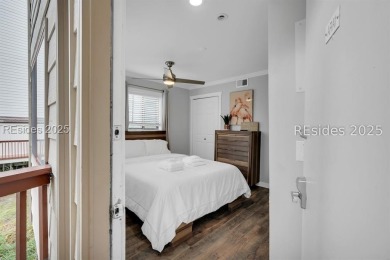 Step into coastal luxury at Admirals Row A1, a first-floor end