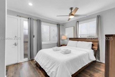 Step into coastal luxury at Admirals Row A1, a first-floor end