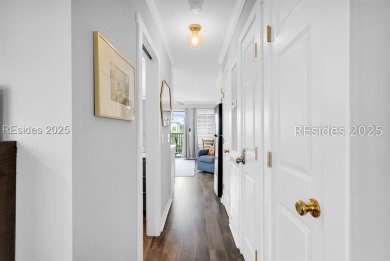 Step into coastal luxury at Admirals Row A1, a first-floor end