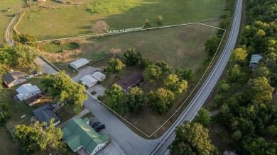 COUNTRY HOME ON ACREAGE! This 3-bedroom, 2-bathroom home sits on