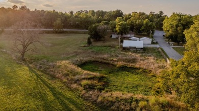 COUNTRY HOME ON ACREAGE! This 3-bedroom, 2-bathroom home sits on
