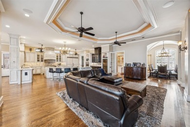 Experience the pinnacle of lakeside luxury in this extraordinary