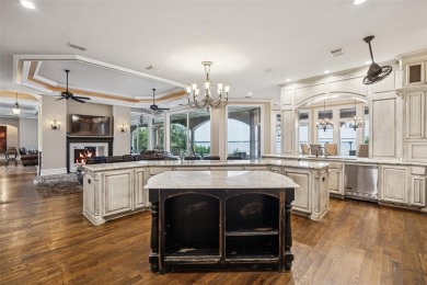 Experience the pinnacle of lakeside luxury in this extraordinary