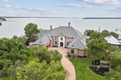 Experience the pinnacle of lakeside luxury in this extraordinary