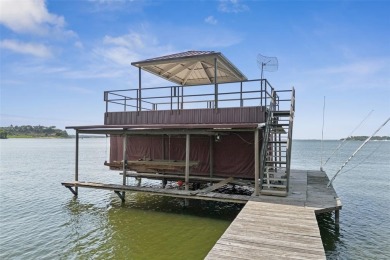 Experience the pinnacle of lakeside luxury in this extraordinary