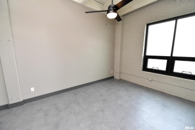 This impressive 2 bed/2 bath unit offers that historic warehouse