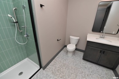 This impressive 2 bed/2 bath unit offers that historic warehouse