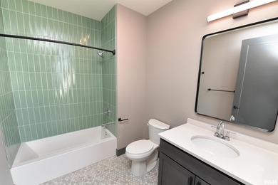 This impressive 2 bed/2 bath unit offers that historic warehouse