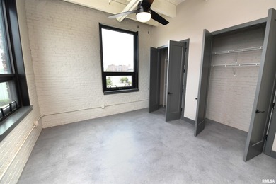 This impressive 2 bed/2 bath unit offers that historic warehouse