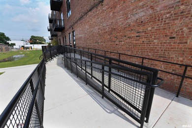 This impressive 2 bed/2 bath unit offers that historic warehouse