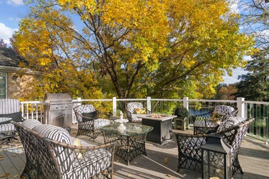 Exquisite and timeless, this custom one-acre estate commands one